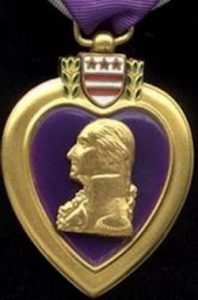 Purple Heart Medal Big "Hand in Hand Branson Honors Purple Heart Recipients," a special event honoring those who have received the Purple Heart for wounds received while serving our country.