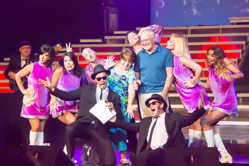 Don and Marsha Meeker enjoying a bit of fun with the the "Blues Brothers" and cast of Branson's "Legends in Concert" show during its July 6th performance. The 4 millionth Branson Tourism Ticket that the Meekers purchased was to the "Legends in Concert" show.