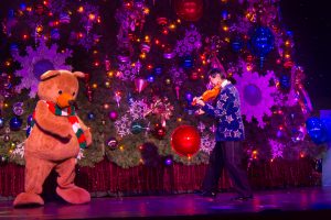 Shoji and one of his many friends during the shows spectacular colorful opening.