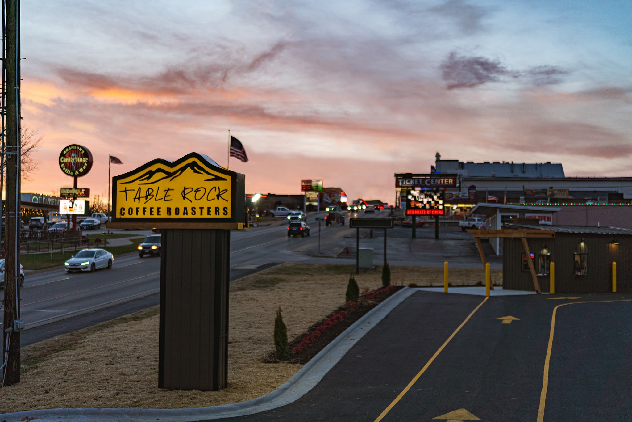 Table Rock Lake Coffee Roasters in front of sunset