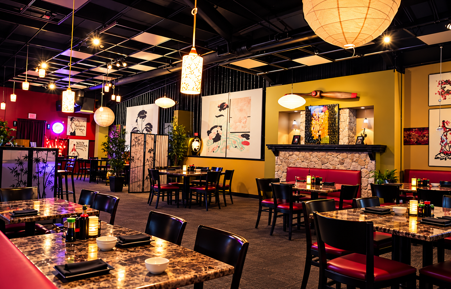 Asian-inspired restaurant interior with marble tables, black chairs with red cushions, warm hanging lanterns, and potted plants.