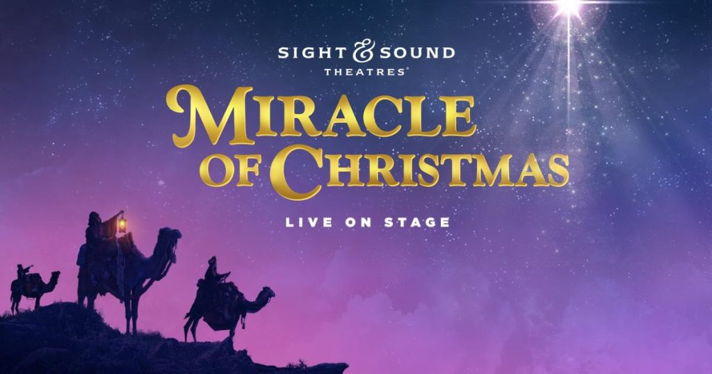 Poster for Miracle of Christmas (Sight & Sound Theatres) with gold title on a purple, starry night and silhouettes of travelers on a hill under a bright star.